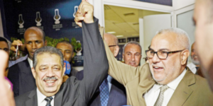 بنكيران وشباط يرفعان أيديهما تعبيرا عن نجاح أولى المفاوضات بين الميزان والمصباح