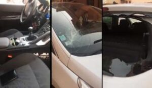 شاهد كيف اعتدى مشرملون على مهاجر مغربي وكسر سيارته.