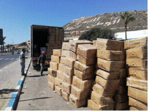 حصري وبالصور:جمارك أكادير تضرب بقوة و تحجز أحدية رياضية مقلدة لمركات عالمية