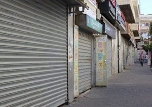 أكادير : فيروس كورونا يتسبب في إغلاق محلات تجارية... 2 a 25