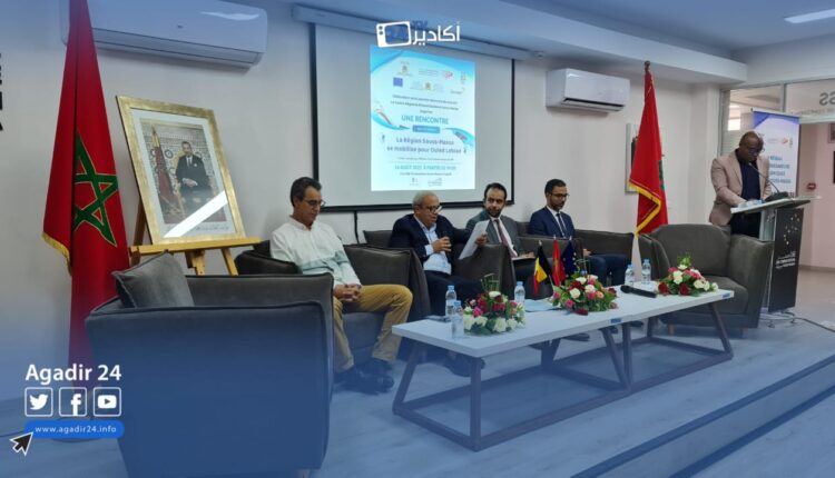 ملتقى اليوم الوطني للمهاجر 13